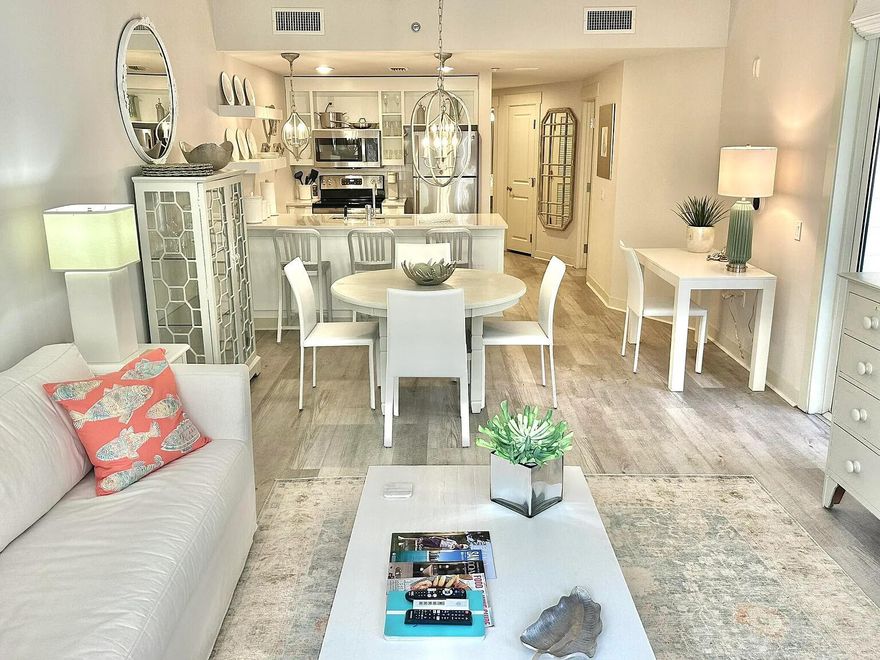 This 2nd Floor ONE OF A KIND Large 1 Bedroom 1 Bath UPDATED Condo is Located in Bahia at The Village of Baytowne Wharf at Sandestin Golf & Beach Resort. Condo has been Completely Renovated with New Wood Plank Flooring, Updated Bathroom and Kitchen(with New Stove and Microwave). Fresh Paint, Modern Furnishings, Updated Lighting and a Private Balcony Overlooking the Gardens and Pool Area.. Condo Recently Has Added a New HVAC and Hot Water System.Parking  Garage Under Bahia with Additional Storage Area. Watercolor Painting over the Sofa is the Only Exclusion. Condo has been used as a Second Home for the Past 5 years.