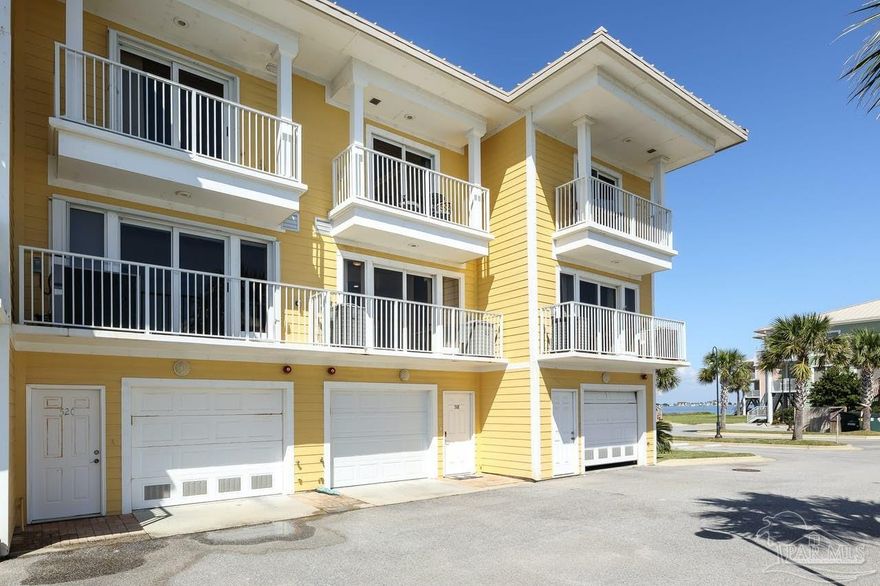 Stunning Waterfront Property with Gulf & Sound Views + Elevator | Turnkey Investment OpportunityWelcome to this beautifully appointed, move-in-ready home on picturesque Pensacola Beach -- offering the rare combination of elevator access, breathtaking views of both the Gulf of Mexico and Little Sabine Bay. This location can be used for full-time living, a vacation rental, or a second home.This 2-bedroom, 2.5-bath residence features a spacious open-concept living area with an eat-up breakfast bar and panoramic water views. The primary suite offers a private balcony, handicap-accessible en suite bathroom, and large walk-in closet. The second bedroom also includes its own private balcony with Gulf views and an en suite bath, creating a perfect guest or rental setup. All this beautiful property situated on Pensacola Beach is missing is you! 