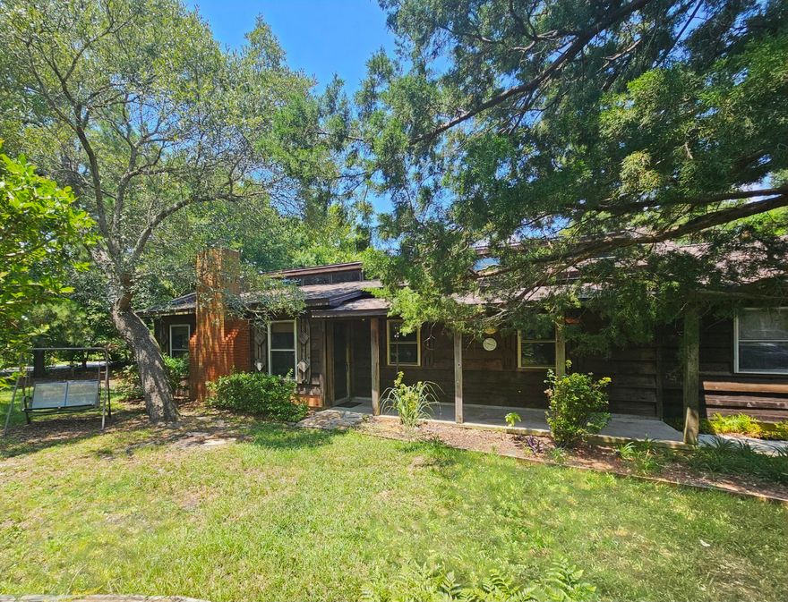 Are you ready to live the Florida lifestyle? From this home it is just 10 miles to Pensacola Beach - 12 miles to Navarre Beach - 14 miles to downtown Pensacola. Situated on a large corner lot this property has beautiful, mature Live Oak trees, large cedar trees and a setting that gives you privacy from the street. There is plenty of room for your boat or RV. Do you like gardening? Start planting in your large, irrigated garden plot. The roof on this house was replaced in 2023 - The water heater was replaced in 2022 and the HVAC in 2015. This property is in a great school district and the brand new, $110 million Soundside High School, is currently being built and is scheduled to open in 2026. Click on the virtual tour and make plans to stop by the open house Sat. Aug. 10 from 11:00 - 2:00