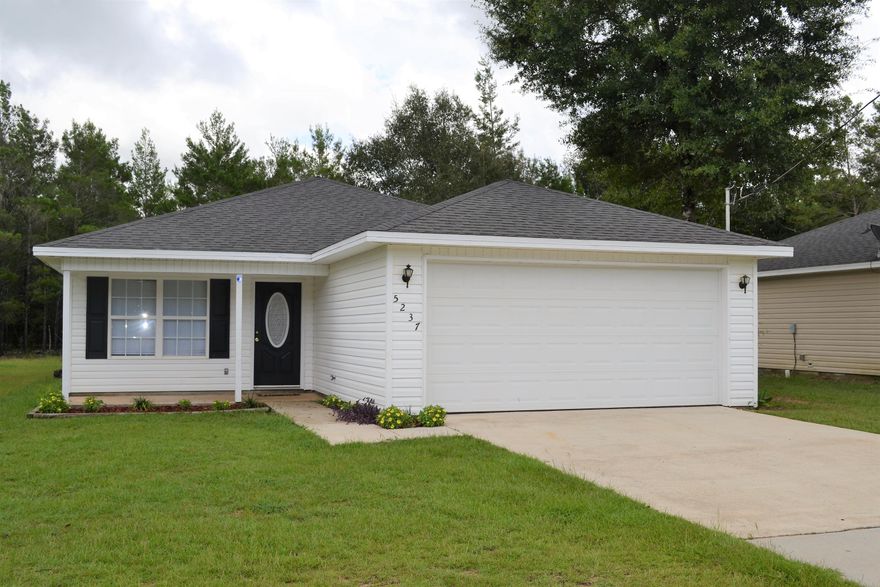 Easy on the eyes and the pocket! This 3 bed 2 bath has been renovated and is move-in ready at a great price. New laminate floors, new carpet and updated kitchen complete with new appliances. The home has just been professionally painted and the charming details are a must see. The kitchen provides great space with plenty of space for your dinner prep and lots of cabinet space! Move right from the kitchen into a perfect dining area. The living space is open and bright with a tray ceiling. The bedrooms are towards the back of the home providing plenty of privacy. The spacious master also has a tray ceiling and a very large master bathroom with separate walk-in shower and tub. Lots of closet space!