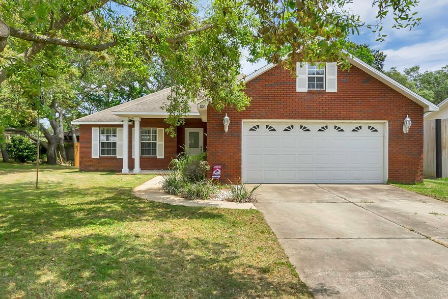 AVAILABLE NOW!!  Rare corner lot located in the heart of Destin, all brick 3 bed 2 bath home boast granite countertops in the kitchen with stainless steel appliances and a large island that opens up to the dining room and living room that displays trayed ceilings, wood floors. and crown molding. The master bedroom has recessed lights plus a nice size walk in closet. The Master bath has a double vanity and a separate shower. The guest bedrooms are carpeted and complimented by an oversized guest bathroom with shower/tub combo. A double car garaged is accompanied by 2 car drive way and an additional parking pad for a boat or extra motor vehicle.