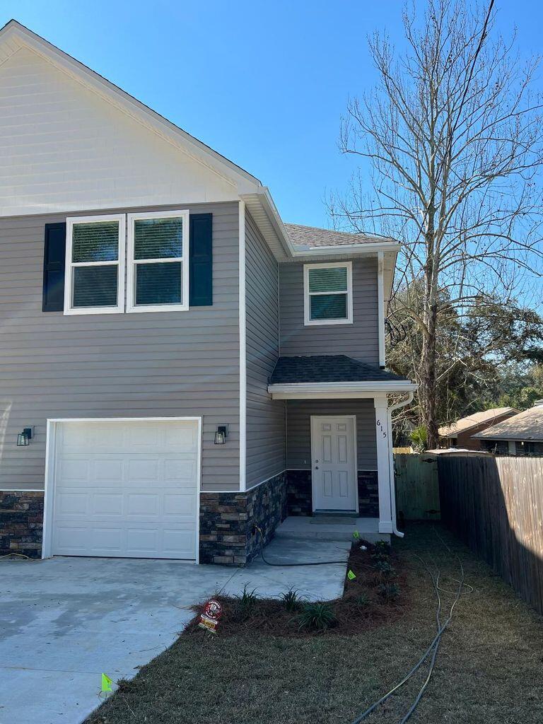 MOVE IN READY... 3bd/2.5bth NEW BUILD located in the heart of Niceville. Features include Samsung appliances, impact windows and doors, fenced yard, & vinyl plank flooring on the main floor. Home also boasts a spacious open floor plan, quartz counters, pantry, and an oversized master suite with an attached bath and walk-in closet. The master bath has a separate shower and soaking tub with a private water closet. Two additional bedrooms share a bath, and the laundry area is located upstairs. NO smoking. Pets allowed upon approval with a non-refundable pet fee. Minimum 600 FICO credit score required in addition to meeting applicant rental criteria.