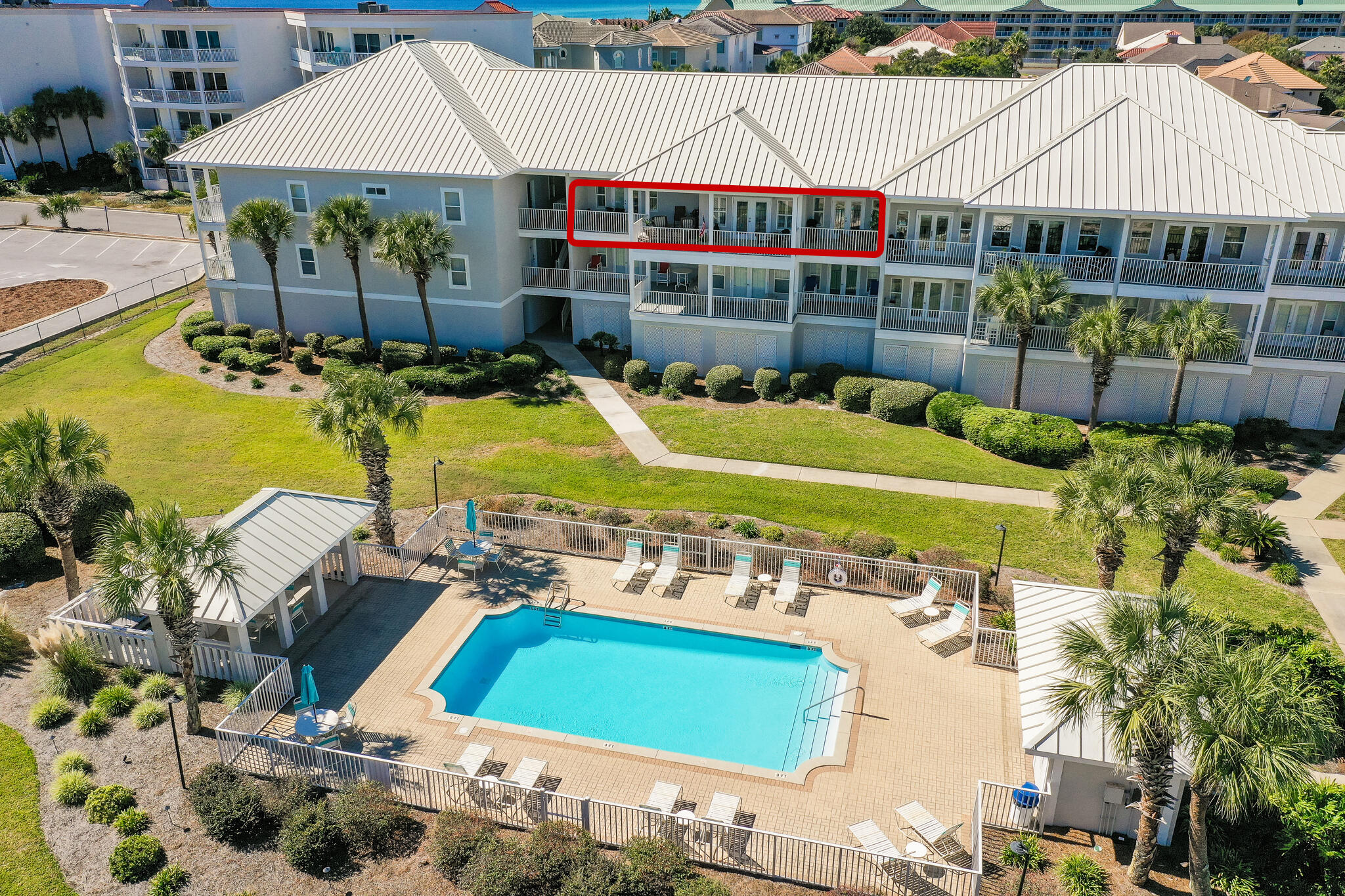 This is a gorgeous furnished 1563-square-foot luxury condominium directly across from the Gulf of Mexico's sugar-white sands and emerald-green waters. Located on the 3rd floor in the beautiful Pavilion Palms gated Community, it boasts professional decor and plenty of space to accommodate your family and friends. The open floor plan includes 10-foot ceilings, a spacious kitchen, granite countertops, and travertine flooring. There is plenty of seating in the living room with French Doors opening up to over 500sq/ft of terrace space overlooking the community pool area.A spacious laundry room just off the kitchen accommodates a full-sized washer and dryer and provides easy clean-up after a day at the beach or lounging by the pool!