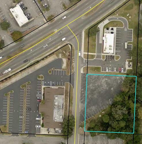 .84 commercial acre with great visibility from Mary Esther Cutoff, sits by Chipolte and across the road is Golden Corral Restaurant and Home Depot, cleared property for commercial development, survey available