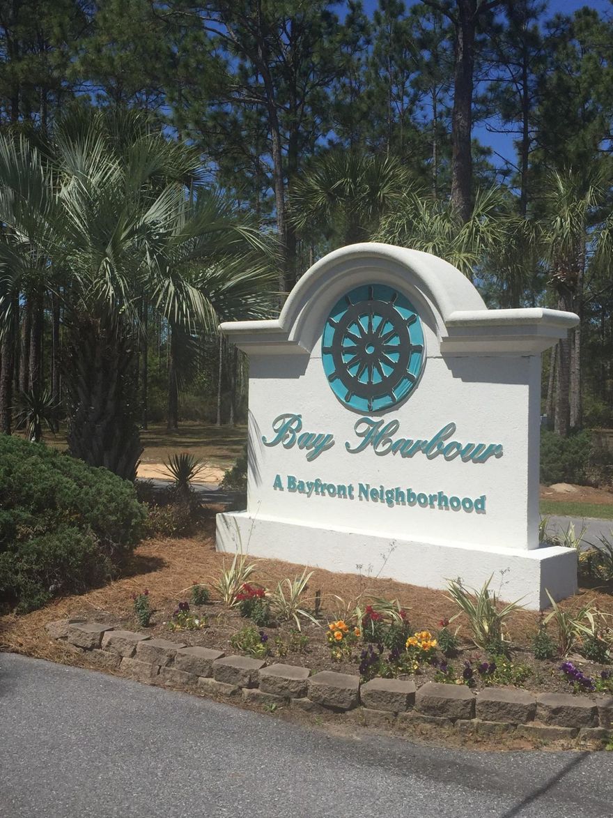 Motivated Seller in this lovely, impeccably maintained bay front community with low HOA fees! This beautiful wooded lot with bay views is just waiting for your dream home! Bay Harbour sits on 175 acres of nature preserves with a boardwalk over the marshes along with a dock on the bay! There are tennis and basketball courts, separate RV & boat storage, underground utilities and lighted paved streets. All this and only a 30 minute drive to the beautiful beaches of South Walton with Freeport being one of the fastest growing communities in the area!