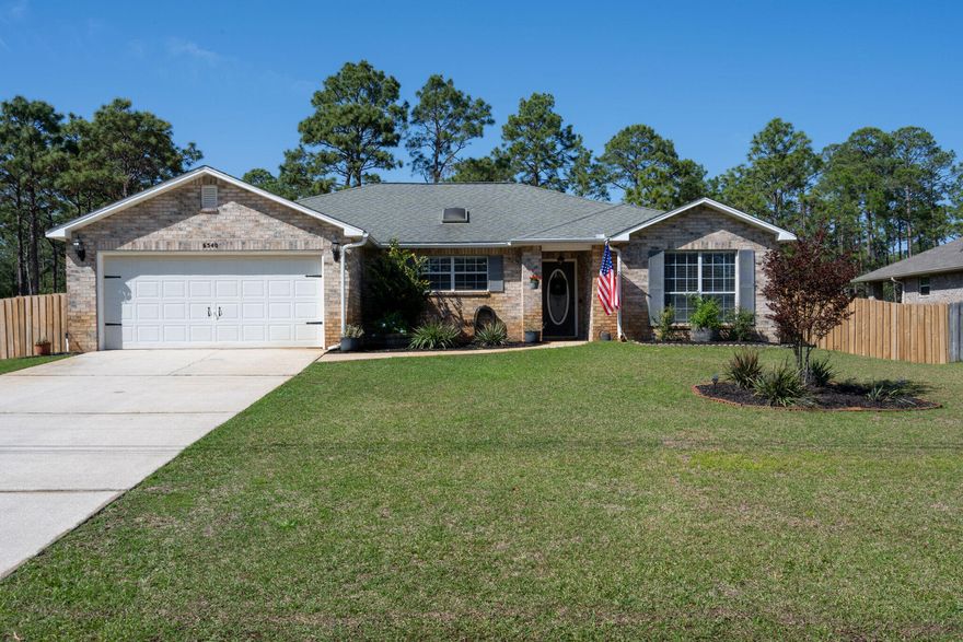 Holley By The Sea! Move in-ready, beautiful home with adorable upgrades and decor. The open concept kitchen is updated with white cabinets, quartz countertops, tile backsplash, new stainless steel appliances and hardwood laminate flooring throughout to include the master suite. The master bathroom has dual sinks and both bathrooms have new tile. Each bedroom has an on trend accent wall and carpet. A new A/C unit, thermostat and air purifier were recently installed. The privacy fenced back yard is large and has a shed, pergola and firepit for family time and entertaining. Come and see this gem today!