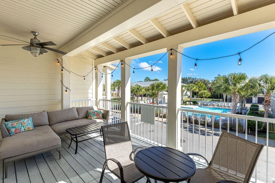 This attractive Destin townhome is ideally located--just three blocks from the beautiful beach and a stone's throw from local restaurants and activities. Boasting almost 2,000 square feet, this three-bed, two-and-a-half-bath home has a reverse floor plan. On the first floor, two large bedrooms and a shared bathroom comfortably accommodate family and friends. To the front of the property, you'll find paved parking for two vehicles and a single-car garage that provides storage for beach toys, bikes and paddleboards. A small porch covers the entrance door. The rear yard is a peaceful green space for barbecues, with a covered porch providing welcome shade. Head upstairs to the second-floor living space, where neutral wood laminate flooring and a shiplap wall complement the stylish plantation shutters, recessed lighting and coastal-inspired decor. The open floor plan flows naturally from the spacious sitting area through the formal dining space to the kitchen. Stainless steel appliances and granite countertops deliver a clean, fresh look to the well-appointed kitchen. A separate in-unit laundry room takes care of beach towels and additional storage. The second-floor master suite is at the rear of the property. It boasts a walk-in closet and a modern ensuite bathroom with a double vanity and a tiled shower-over-tub combo. The living room opens directly onto a generous 10-foot-deep balcony with pleasant views of the community pool. It's a delightful space for relaxing, reading and entertaining. As well as a pool, this friendly neighborhood has a dog park. Enjoy walking, riding a bike to Henderson Beach State Park or take advantage of the plethora of activities and restaurants that Destin has to offer. Big Kahuna's Water Park and the Destin Harbor are just some attractions nearby.