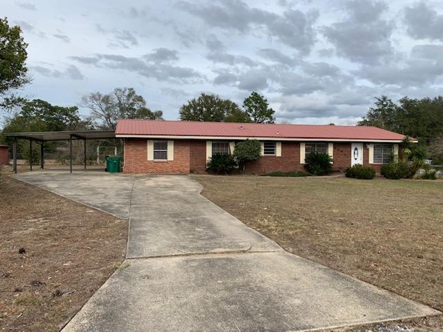 Welcome Home! ~ 4 bed ~ 2 bath ~ 1 acre corner lot ~ Kitchen w/Breakfast Area ~ Bonus Room/Den ~ Florida Room ~ Spacious laundry room ~ Fenced back yard ~ Storage Building