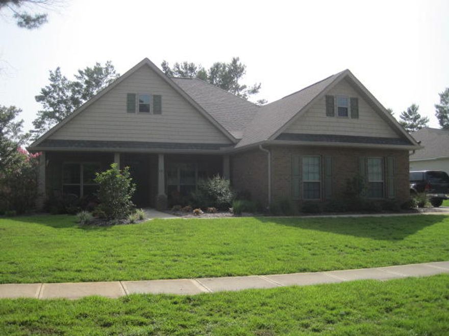 Pond front home offers 3 bedrooms and 2 full bathrooms plus a powder room. Featuring: 2,315 of open living space, granite counter tops, split bedroom, covered patio, fire pit and fenced backyard. HOA, Cable and garbage included. Enjoy all that Hammock Bay life has to offer.
	
Hammock Bay is a pedestrian-friendly development. There are network of sidewalks, nature trails, and bike paths. The Hammock Bay Town Square-lawn-style amphitheater is designed for entertainment. There is also a $12+ million, 60-acre Sports Park featuring a multitude of ball field/park amenities nearby. Recently the developer donated land for two schools to be built in Hammock Bay.