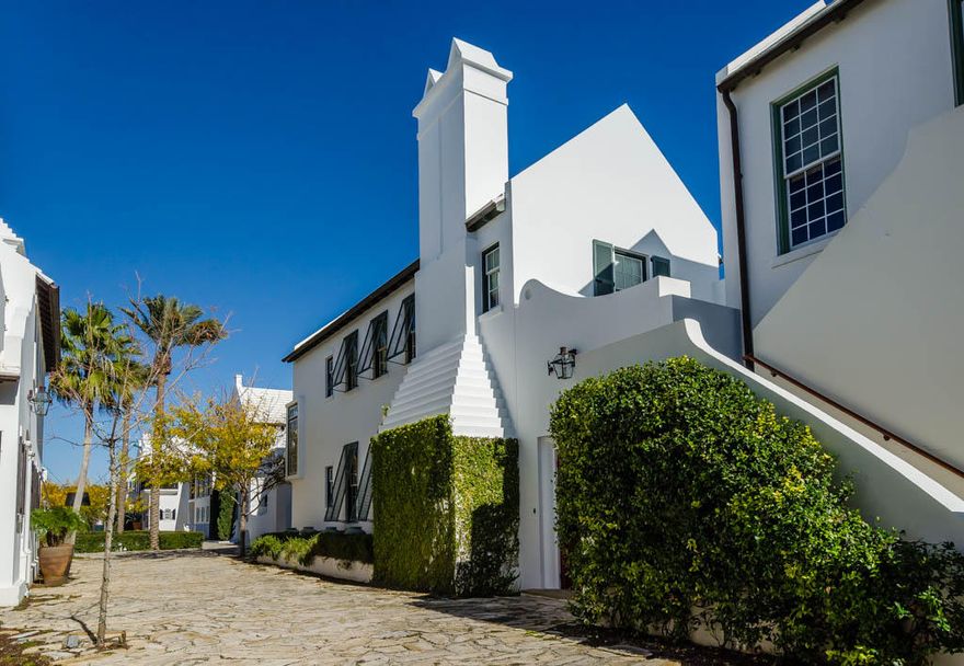 Located on one of the largest homesites fronting Sea Garden Walk, 57 Governors Court has over 1,700sf of courtyard area. 3,096 square feet of conditioned living space consists of a very private first floor master, a junior master and two upstairs guest bedrooms. This home has consistently been one of Alys Beach's top performing rental homes with future revenue currently on the books. Home is being sold furnished. Parking Ct. fees are $150.00 per quarter.