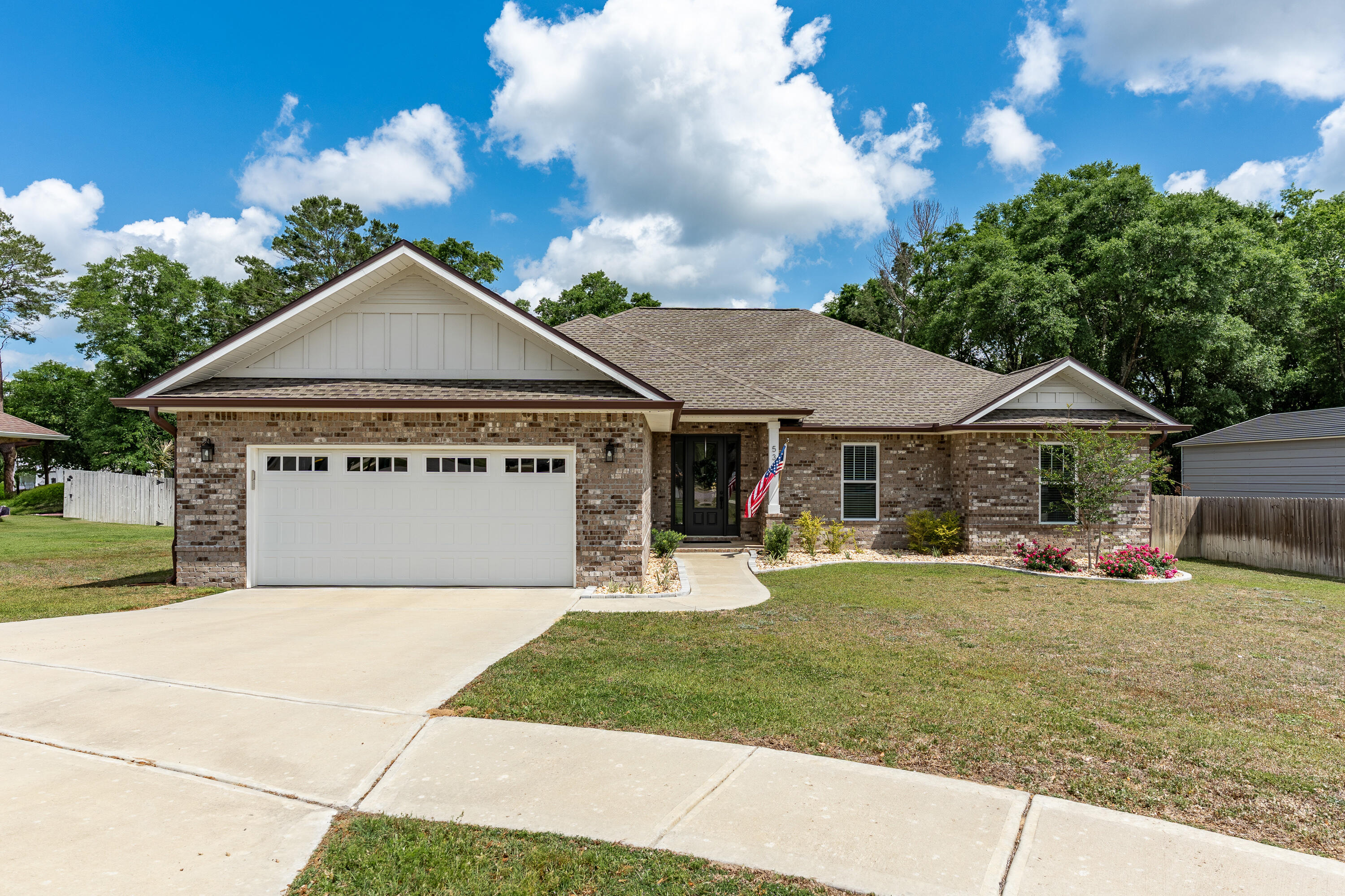 VA ASSUMABLE and LIVES LIKE NEW! Be the fortunate new owner of this stunning all brick house. Exceptionally well maintained and clean, clean, clean. The inviting front door and foyer opens to a functional open floor plan, with huge windows looking out to the backyard. The spacious kitchen offers white shaker cabinets, gleaming stainless appliances, granite countertops, a coffee nook and a breakfast bar. All bedrooms are a really good size with ample closet space. Fall in love with the master suite - notice the fabulous architectural ceiling details with recessed lighting, his and her sinks, soak tub with tile surround and walk in shower. Enjoy your morning coffee and evening cocktails out on the covered back porch. The back yard is huge and ready for fun in the sun - games, BBQ - just a great space for entertaining. This home, with a split bedroom floorplan, offers the perfect blend of convenience, style and comfort. Come and view this home today, and make it yours... you will not be disappointed