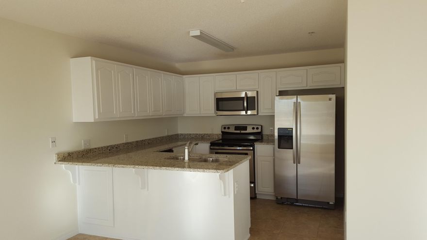 DEVELOPER UNIT !! Like new, completely renovated including granite kitchen counter tops w/undermount stainless steel sink, all new stainless steel appliances, new faux wood window blinds, new sliding glass door blind, new paint throughout. 1 bedroom with hallway bunk beds and 2 bathrooms. Beach access is directly south of community. Nice community pool with showers and restrooms. Association provides basic cable, trash and grilling area. FNB&T is interested in providing financing as is Beach Community Bank. GREAT NEWS--we are VA approved