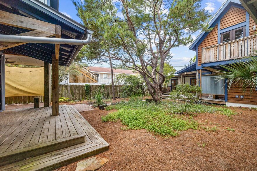 An artist's retreat and an architect's dream, this home features multiple living spaces which surround a central courtyard that is anchored by unique and inspiring landscaping. The property is a mere 700 feet from the Gulf of Mexico where you will find over a half mile of the nearly uninterrupted public beaches of Inlet Beach. Residents of this historic community enjoy warm days on the sand, as well as all the tony shopping and dining along the east end of 30A. There are many special properties in South Walton. None exude as much character or possess as much potential as 217 Walton Rose Lane.Originally an efficiency unit, meticulously planned and built in 2004, the property has been expanded over time.  More recently, in 2015, the main house was completed. Features of this home include 4 balcony porches, a rooftop deck with gulf views, two lofts, a dumb waiter, and a 6.2kw photovoltaic solar electrical generator.

Multiple spaces within this property can be converted to the preferences of the next owner.  There is an art workspace, and an office studio, that are both pre-plumbed to accommodate the addition of full bathrooms; while ample square footage and onsite parking remain for the addition of two bedrooms.

The home is located on a generous lot.  217 Walton Rose Lane was developed in a very ideal and almost irreplaceable (in this stretch of beaches) way.  However, several elements can be easily reconfigured to please any type of owner.  This property is worth a look, and will make for a comfortable home or a strong investment.  