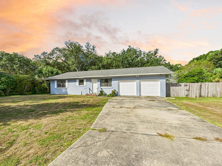 CLOSE TO EGLIN AFB! Opportunity awaits in the desirable Poquito Bayou neighborhood! This 3-bedroom, 2-bath home is perfectly positioned near Poquito Bayou Park, where residents enjoy free access year-round to the playground, picnic areas, swimming area, and boat launch/dock, all with no HOA fees! Situated on a spacious 0.37-acre lot, this property offers plenty of room to expand or update to your own decorative style. The large wood deck and mature trees make the backyard ideal for relaxing or entertaining. Inside, you'll find a welcoming 'L'-shaped open living area with room for both a dining and breakfast space. The family room features a cozy fireplace and sliding glass doors leading to the backyard. Additional highlights include: Granite countertops in the kitchen, Large laundry room, Ceiling fans throughout, fenced rear yard, Two-car garage with extra workspace. Just 3.4 miles to the Eglin AFB gate and a short distance to Longwood Elementary, this home combines convenience, community, and opportunity. Whether you're looking to personalize your first home or invest in a sought-after area, this Poquito Bayou gem is a must-see!