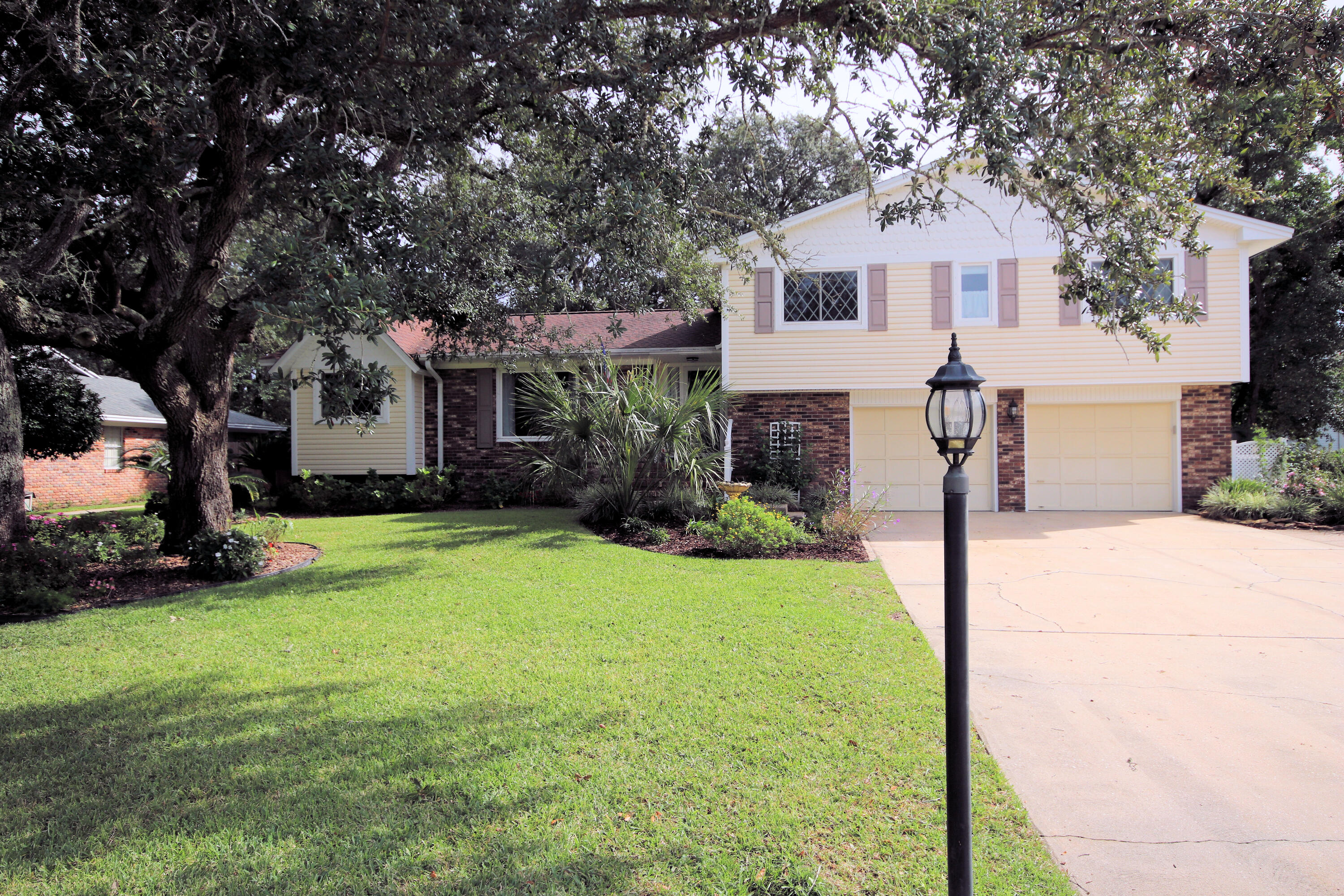 Pictures Coming Soon! Beautiful Yacht Drive! This Home has Plenty of Room Both Inside and Outside. There are 4 Large Bedrooms and 2 baths upstairs. The First Floor is the Living Area with a Formal Living/dining Room Combination and an Eat-in Kitchen, Downstairs is a Bonus Room that Could be Used for a Gym, Crafts, or Office. Enjoy the Shade from the Mature Trees or Relax on the Back Deck. This home also features a Newer HVAC system, Tankless Hot Water Heater and Copper Wiring. The Garage is a Tandem on One Side and a Smaller Parking Area on the Other. Buyer to Verify all Measurements.