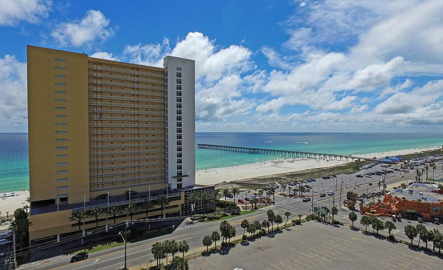 PRICE REDUCTION!Experience the finest in Gulf front living. This spacious condo offers an unparalleled waterfront lifestyle on the Gulf of Mexico. With 9 foot ceilings and located on the very desirable west corner of the building with an unobstructed view of almost 1700' of beachfront...from Sterling Reef to the County pier. This 12th floor 3bd/3ba will give you everything you are looking for.This exceptional unit has never been rented and this unique floor plan gives you the comfort of home or a wonderful investment opportunity for a rental machine. Sterling Reef has covered parking underneath the building. Great location Walking distance to Shipwreck Island water park and goofy golf. Amenities include heated bi-level pool, fitness center, sky terrace. On Pier Park trolley line.