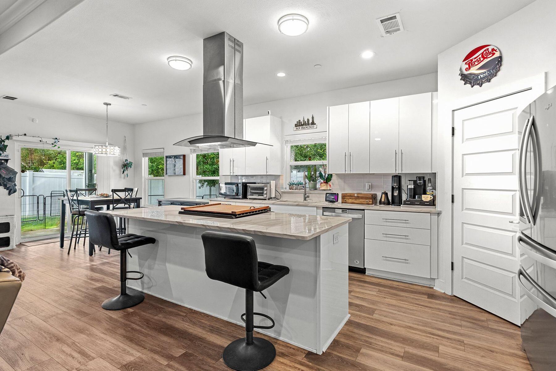 Experience unparalleled quality and detail in this stunning home in the Commanche subdivision of Fort Walton Beach. Built in 2019, this meticulously maintained residence still feels like new and stands out as one of the best-built homes in its price range, offering exceptional value and craftsmanship. Designed with modern living in mind, the large, light-filled open concept plan features high ceilings, recessed LED lighting, and wood-look vinyl plank flooring throughout. The gourmet kitchen is a chef's dream, boasting deep, full-extension industrial strength soft-close drawers, designer fixtures, stainless steel appliances and a large walk-in pantry. The master bedroom offers a serene retreat with an incredible ensuite bathroom with a double vanity, enclosed toilet, garden tub, walk-in shower and a spacious walk-in closet. Additional highlights include a safe room/laundry room and a comprehensive fire suppression system for added peace of mind. Enjoy the Florida lifestyle with covered front and back porches, perfect for relaxing or entertaining. This home is conveniently located minutes from Fort Walton Beach Medical Center, Lowe's, Walmart, and just a short drive to the beautiful gulf beaches. Its proximity to Eglin AFB and Hurlburt Field AFB makes it an ideal choice for military families. With no HOA dues and a focus on quality and modern design, this home is a rare find. Embrace the opportunity to live in a beautifully crafted home that offers comfort, convenience,and style in one of Fort Walton Beach's most desirable communities.