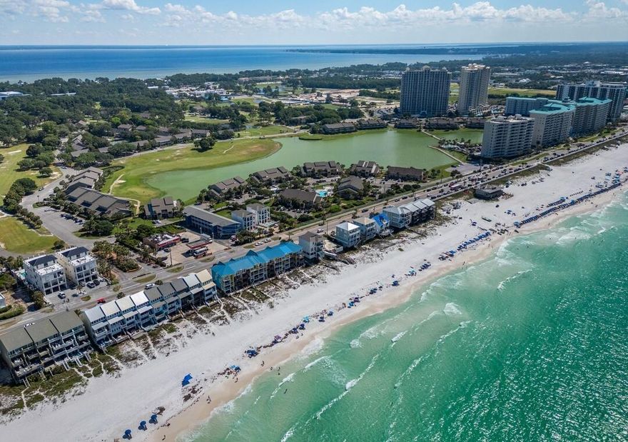 Purchase w/ only 10% down! Welcome to your beautifully remodeled lakefront condo, ideally located within the exclusive, gated Seascape Resort--just 176 yards from the sugar-white sands of the Emerald Coast and offering 2,000 feet of private, deeded beach access. This rare ground-floor unit combines privacy, style, and accessibility in one of Miramar Beach's most sought-after communities.Enjoy serene lakefront views of Stewart Lake from your screened-in patio, surrounded by lush landscaping and world-class amenities. Inside, the condo has been completely renovated with upscale finishes and thoughtful attention to detail. The stunning kitchen boasts sleek granite countertops, premium stainless steel appliances, custom storybook-white cabinetry with pantry, and an open layout that flows seamlessly into an airy living space ideal for entertaining or unwinding after a day at the beach.

You'll love the luxury tile flooring, updated lighting, and calming coastal color palette that makes the entire condo feel like a true retreat. The spacious master suite offers tranquil lake views and a king-sized bed, while the spa-like bathroom provides comfort and elegance. Additional conveniences include an in-unit washer and dryer and a flexible layout designed to maximize both space and light. Every detail has been thoughtfully consideredincluding entertainment. With TVs in the kitchen, living room, and even on the lakefront screened-in porch, you can enjoy your favorite shows or never miss a playwhether you're cooking, relaxing indoors, or soaking in the view outdoors.

Seascape Resort amenities include:

2,000 feet of private beach access

Five resort-style pools (two seasonally heated)

A golf course

Eight tennis and pickleball courts

Basketball courts

On-site dining at the iconic Whale's Tail Beach Bar & Grill

Proximity to Silver Sands Premium Outlets, Grand Boulevard, and The Village of Baytowne Wharf

Whether you're seeking a personal beach retreat or a turnkey investment opportunity, this lakefront gem offers the perfect blend of luxury, location, and lifestyle. Move-in ready and minutes from everything Miramar Beach has to offer this is your chance to own a piece of paradise on the Emerald Coast.

Qualified buyers can purchase w/ only 10% down.
