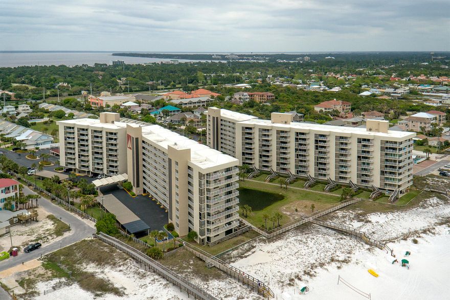 Gorgeous 3BR/3BA, 1,462SF Condo with amazing views of the Gulf.  Located in building one, the closest building to the Gulf.  Entering this fully furnished condo, you are greeted with a bright & open floor plan.  The kitchen features solid surface countertops, white appliances, breakfast bar, & laundry closet.  The dining and living area are opened with a mirrored wall giving you beautiful views of the Gulf.  The balcony is large with access from the master bedroom & living area.  The master has a deep tub with tile backsplash, solid surface countertops with a makeup vanity, & balcony access.  Other features include 2 additional bedrooms, one with a private bath, & an owner's closet.  Mainsail amenities include 24hr security, 2 pools, 700 feet of beach access, & more.  See you at the Beach!