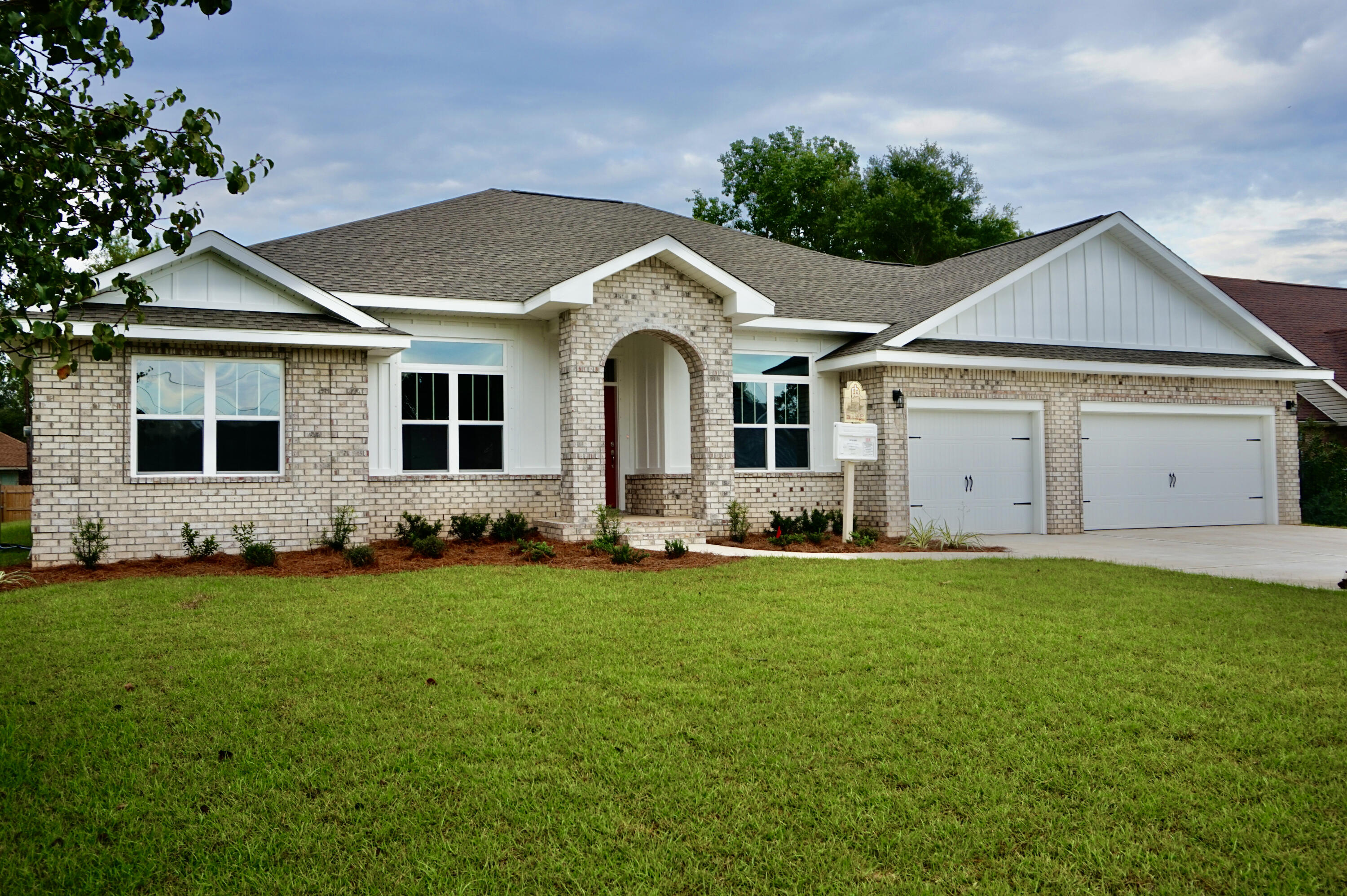 NEW CRAFTSMAN Custom Built Home in Holley By The Sea,Enjoying all the Club House amenities including :Pools,Fully Equipped Gym,Tennis Courts,Waterfront Park & Deeded Access to Santa Rosa Sound This luxurious 4 bed/3 bath Tri split floor plan is under construction...and will be ready in time for your end of year move in ~Great Location within HBTS..with easy access to Navarre Beach, shopping and Hwy 98 to Hurlburt Field AFB.This Stunning Robbins Builders Custom Home offers trend setting design & features~Greeted by a walk in foyer open to the Formal Dining and Office through to your open floor plan ~Large Gourmet kitchen enjoying shaker cabinets with crown molding ~ beautiful granite counter tops~Tiled Back splash~Under Mount Sink~S/S