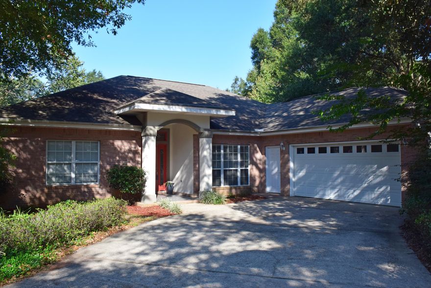 NEW DIMENSIONAL ROOF INCLUDED IN ASKING PRICE! If you seek both prime location and quality in your next home, then 4301 Hidden Lakes should be on your must see list! Built for a very selective buyer, this home was designed for comfort and built to last! The covered entry porch and the attractive leaded glass front door offer a warm welcome to your guests. As you step into the tiled foyer, you'll see the bright,spacious great room which features tongue-and-groove bamboo flooring, a corner gas fireplace, 11' ceilings, deep crown molding, and recessed lighting. Plan to entertain in style in the large dining room which also features wood floors and beautiful crown.The recently updated family-sized kitchen provides lots of cabinet space,