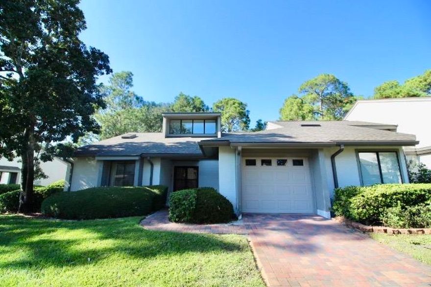 This one story ''golf villa'' is located in the heart of Bluewater Bay and is just steps from tennis, the pool and the golf club. The residence features a split bedroom plan with a dining area and an eat- in kitchen. The living room is spacious, open and features a vaulted ceiling and fireplace. The kitchen, breakfast nook, living room, master bedroom, and enclosed porch all have views of a natural green space. This residence features a great location and is just minutes from the beaches, shopping and state parks and recreation areas. This property is being sold to settle an estate.