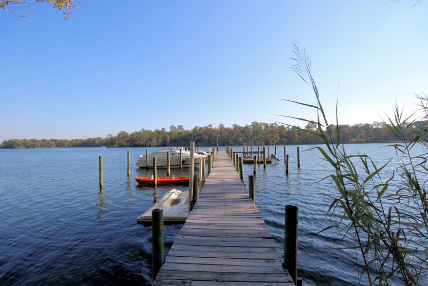 Wonderful Opportunity to Own in this Waterfront Community! Convenient to Eglin AFB, Turkey Creek Nature Trail, Mattie Kelly Arts Center and NWF State College. Zip over the Mid-Bay Bridge to Destin. New Roof and HVAC -2015!! This 2 Bedroom 2 Bath Unit has an Attached 2 Car Garage. Lovingly Maintained. Concrete Floors with Stained Epoxy overlay for easy care! All Rooms are Generously Sized and on One Level. The Living Area has Sliding Glass Doors that Open onto the Patio - Great for Entertaining! Enjoy the Open Floor Plan and Note! You Have a Breakfast Bar as well as Plenty of Space for your Table.The Complex Boasts a Community Dock and Boat Slips (available for Rent) The Pool and Club House are Just Steps Away From this Home & Available for Hosting Parties! Buyer to verify all measurements.