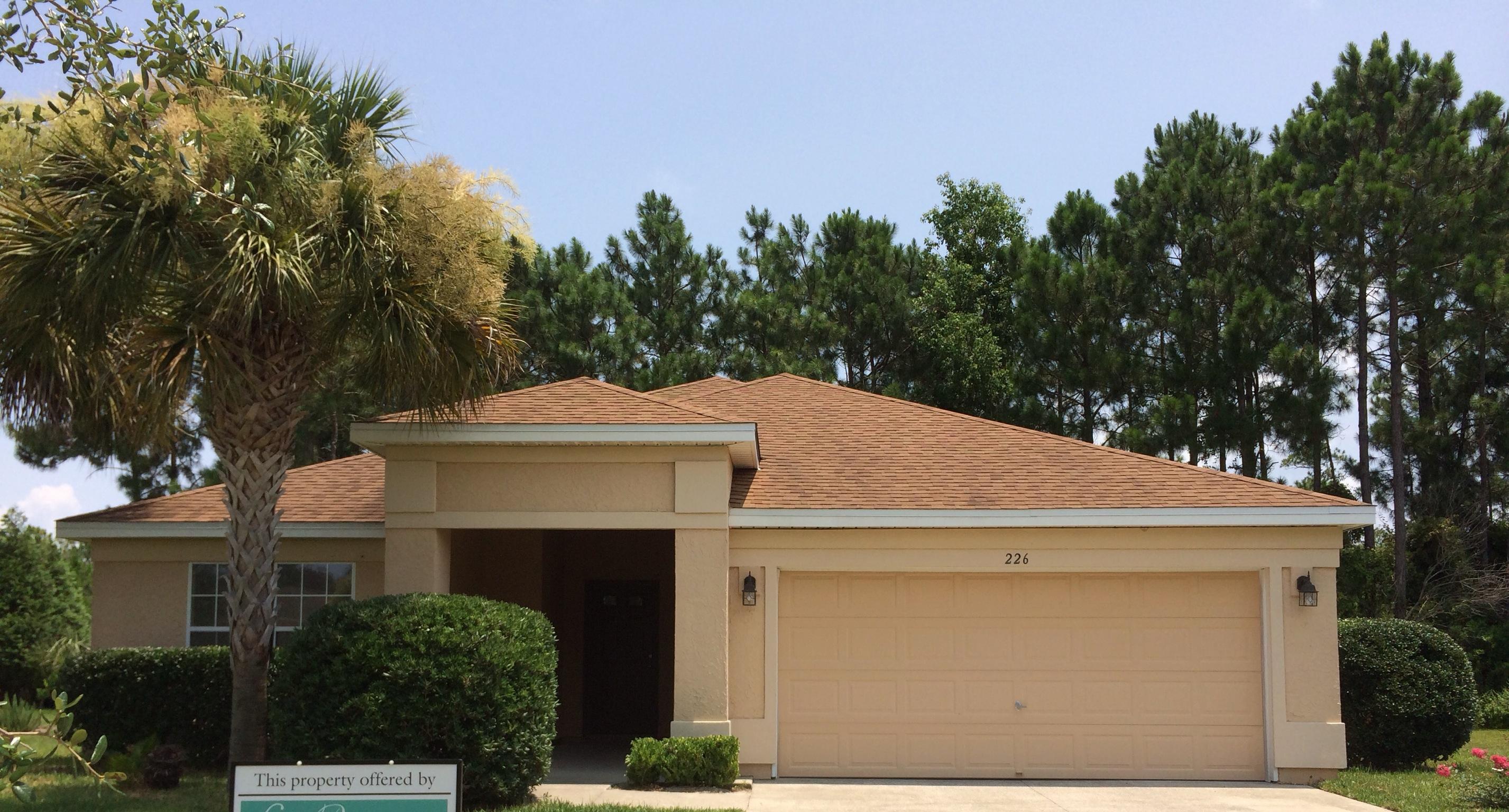 Beautiful MOVE IN READY 3 bedroom 2 bathroom single family home located in the wonderful community of Palmetto Trace. Cathedral ceiling in the living room area with NEW carpet. Large sliding glass doors open up to a covered patio area. Spacious kitchen has high ceilings, NEW stainless steel appliances, wood cabinets, tile floors,a raised breakfast bar,off kitchen laundry room, and nice size kitchen pantry. The dining room is just off of the kitchen and is tiled for ease of maintenance. All bedrooms have NEW carpet. Entire inside of home has been freshly painted and professionally cleaned. Neighborhood has a fantastic community pool with a gazebo/pavilion, sidewalks, and street lights. Close to beaches, Pier Park, Schools, great dining, grocery stores, Frank Brown Park and more!
