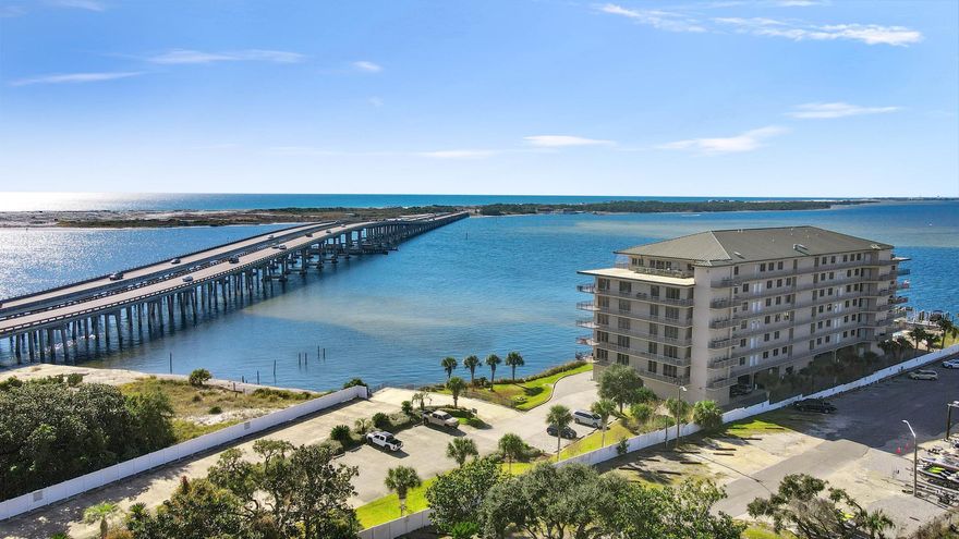 Could easily be converted back into a 3 BR/3Ba condo.  Just add a wall separating the LR and where the Master Bedroom was.  Beautiful condo with unobstructed views of the East Pass, Choctawhatchee Bay, the Destin Harbor and Crab Island.  Great view of the fireworks from the Emerald Grande.  Fresh paint through out and new carpet in the bedrooms.  There is a bay front pool, gazebo with grills and a marina.  One parking spot conveys.  Gated community, with exercise room and community room.  NO Short term rentals.  Owners may have pets less than 40lbs.  There is not a refrigerator or washer dryer in the unit.  All dimensions are approximate and should be verified if important.