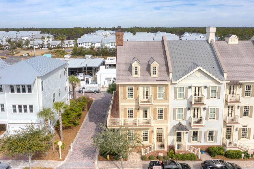 Under Contract with Kick-Out Clause. Three-story, 5-Bedroom, 5.5- Bath luxury corner unit townhome in the popular Prominence neighborhood. Offered fully furnished and rental ready, this property features a Main House with 4 Bedrooms and elevator access to all 3 levels, a Carriage House with an additional bedroom over a two-car garage, and a private courtyard connecting the two. The main level of the home is an open, fluid living dining and gourmet kitchen space that flows seamlessly together.The kitchen boasts Thermador appliances, newly painted cabinets and backsplash, an ice machine - perfect for filling your beach cooler - and a separate wine fridge. Each of the 5 bedrooms has access to its own porch and en suite bath, making this an ideal vacation rental
