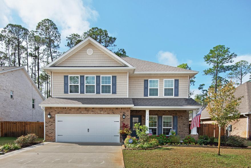 Located on a spacious lot in desirable Peach Creek, this immaculately cared for brick home was built in 2020. Upon walking in, you are greeted by an open floorplan and a clean color palette. The kitchen was upgraded with a gray and white tile backsplash and has crisp white cabinetry and granite countertops. Just off the family room and kitchen, you have a convenient and upgraded half bathroom. Downstairs, enjoy the master bedroom complete with an ensuite bathroom and walk-in closet. The bedrooms have new carpeting that is plush and very well taken care of. Once upstairs, you are greeted by an expansive bonus room with access to the three bedrooms, two bathrooms, and a large laundry room. This newly built home has plenty of storage with many generous closets.