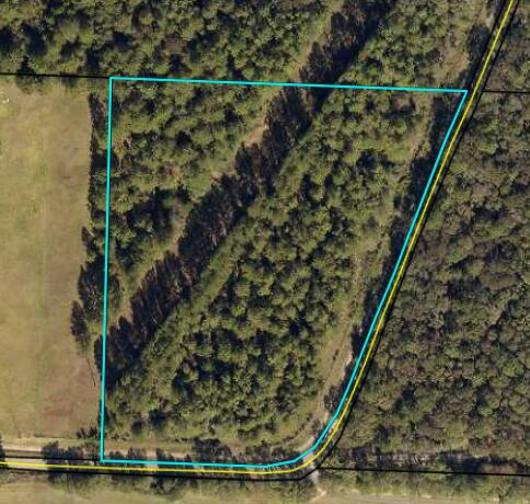 Entered for comp purposes. 6.69 Acres with powerline easement. Property was fenced on the road side as well two culvert drives conveyed with the property.