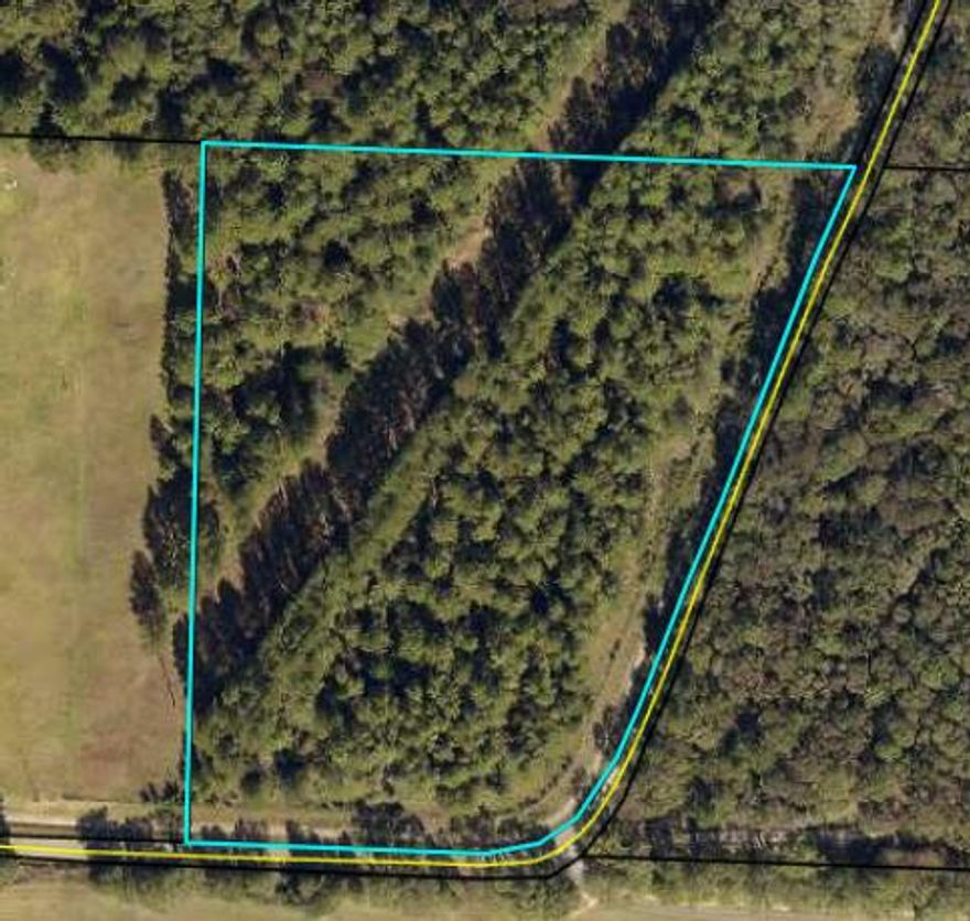 Entered for comp purposes. 6.69 Acres with powerline easement. Property was fenced on the road side as well two culvert drives conveyed with the property.