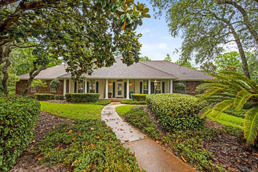 Back on the market with no fault of sellers! NEW ROOF 7/2018! Gorgeous executive one story home meticulously built for the discerning eye. Located in the beautiful gated community of Southwind, this 4 bedroom 3.5 bath home is perfect for extended family or guests with 2 master suites! Each master suite includes its own ensuite, walk-in shower, garden tub, and walk-in closets with California Closet shelving systems. You will feel as if this breathtaking home were built just for your family. A stunning entry with vaulted ceilings in the living room, stone gas fireplace, eat in kitchen, formal dining area, spacious Florida room, with an expansive back patio area brings the whole family/group together while providing space for all to enjoy! Large lot & half ensures privacy!