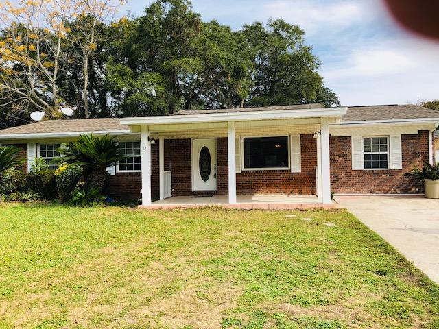 This is a great family home in the heart of Shalimar. Its open floor plan and cozy all season Florida room make family time and entertaining easy and fun for all. The tile floors throughout are easy to maintain and the many windows make the rooms bright and welcoming. This home has two master bedrooms (one could be a guest or mother-in-law suite). The roof and A/C are less than 5 years old. Thirteen month home warranty offered. The private back yard is a great place for family gatherings and cookouts using the outdoor brick barbecue. Freshly painted and ready to move into and make it your own.