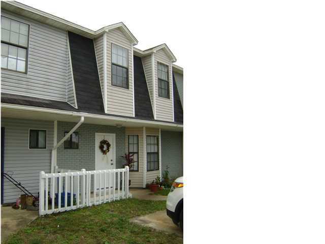 This townhome is a must see and move in ready. Once you enter you will notice the beautiful bamboo flooring. The living room, kitchen and eating areas are very open. The kitchen boasts a Swan Stone sink, stainless steel appliances, track lighting and a pantry. The first floor full bath has a walk-in shower. The large master bedroom boasts two window seats and a built in desk area giving this room added character. Owner has updated most everything; kitchen sink, appliances, 6 panel doors, flooring, lighting and painting. The sun room has beautiful upgraded tile. French doors lead from the sun room to the privacy fenced back yard. Some windows have been replaced. Square footage is from previous appraisal. Buyer to verify all measurements deemed important. PROPERTY TO BE SOLD ''AS IS''.