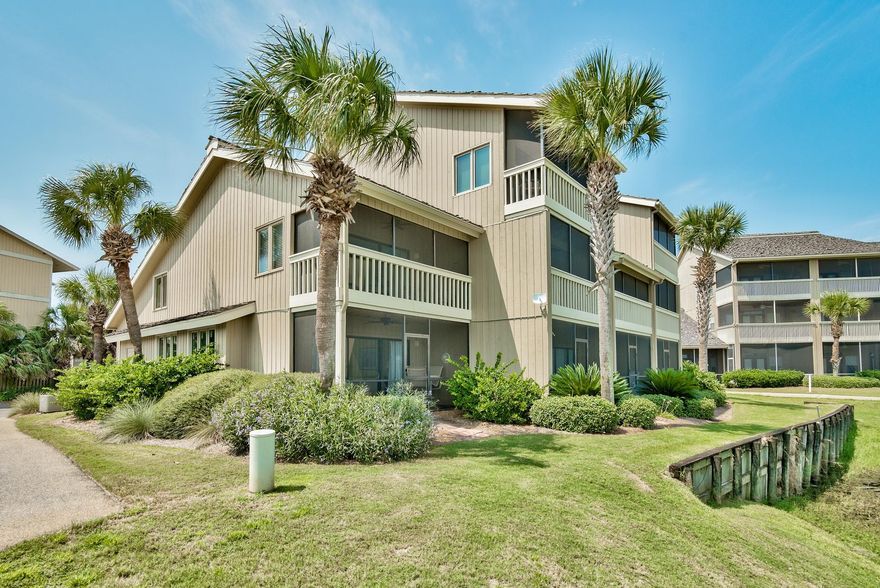 Incredible opportunity to own a phenomenal 3-bedroom, 2-bath renovated condo within Seascape Lakefront Villas - a prime location of Seascape Resort just steps away from the beach. Enjoy the serenity of Stewart Lake right outside your patio along with emerald green waters of the Gulf of Mexico just across the street. This is an end unit which rarely come on the market and is in high demand! Access the property easily from ground level and enjoy the extra privacy with no owners above you. The entire unit has been fully updated with beautiful tile floors, new upscale kitchen & bathrooms and high end furniture. The kitchen is extremely impressive with stunning Quartz countertops, stainless steel appliances, custom lighting, new cabinets and unique backsplash. Every detail has been thought out!