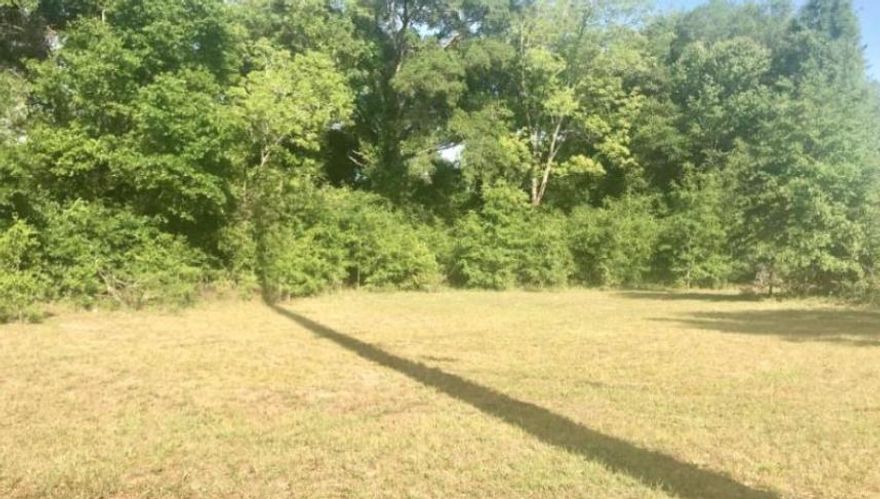 Great cleared, leveled corner lot just 1 block from Hwy 85 South. One lot that can possibly be divided into 2 separate lots. Utilities should still be in place. Zoning is R-2 and the Future Land Use is MDR-Medium Density Residential *buyer to verify all information*