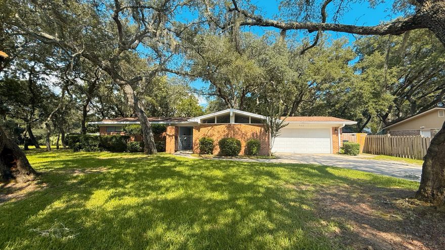 Perfect blend of Mid Century Charm with upscale modern finishes and updates. Easy, one floor living convenient to Fort Walton Beach amenities, shopping, dining, entertainment. Complete kitchen renovation in 2021 including cabinets, backsplash, appliances and quartz counters. Baths have been recently updated/remodeled. Interior has new drywall with fresh paint, recessed lighting and more. Unique location adjacent to park with city easement. The home boasts an all brick exterior, large fenced lawn with storage building and easy access. Convenience, style and location! This one has it all.