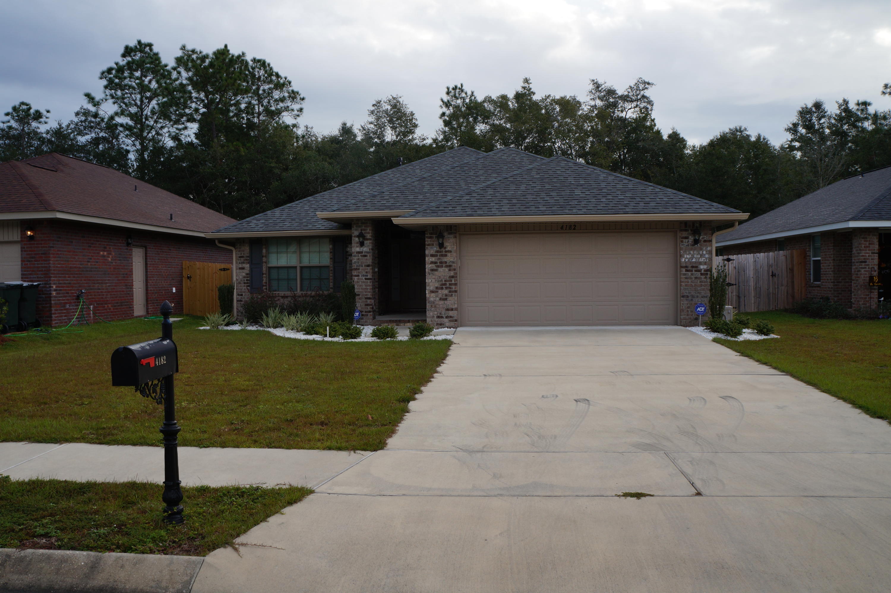 Beautiful Brick Home in Monticello Estates! Convenient to Historic Downtown Milton and I-10! Stroll the River Walk. Bike the Tree-Lined Cycling Path. Fish! Boat! Enjoy the Feel of the Country all within minutes of the Beaches, Shopping and Restaurants. This 4 Bedroom 2 Bath Home has Numerous Upgrades. Hurricane Storm Protection. Bullnose Corners. 5'' Baseboards. Seamless Gutters around the Whole House. Custom Blinds. Wired For Security. Gorgeous Kitchen with Breakfast Nook, Granite Counters, Large Pantry and a GAS RANGE! Dining Room for Special Occasions. Spacious Great Room. Master Suite features a Garden Tub for Soaking and a Separate Shower. Double Vanity with Granite and Moen Faucets. Screened Patio where you can enjoy the sounds of nature! It's a ''Must See''.