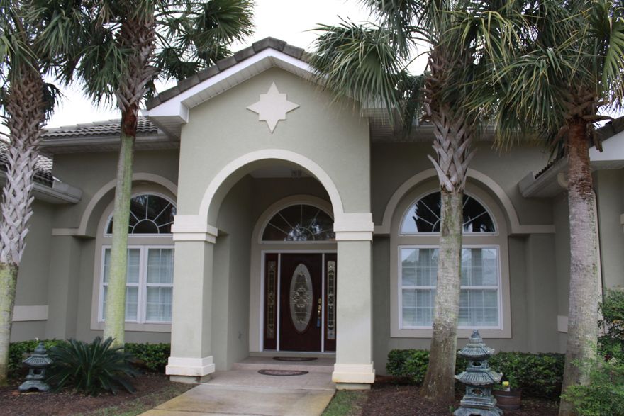 EMERALD BAY GOLF COURSE- This Luxury home is located on the 6th fairway. Custom built with Quality in mind. As you enter the foyer your eye's will focus on the coffer, trayed and crown molding in the ceiling's. Step into the family room and view the covered pool and porch. This home has an office/bedroom with interior shutters. Open Kitchen area with custom Maple cabinets and granite counter tops. Jenn-Air cooktop,& GE Profile appliances. Built in surround sound and security system. Tropical landscaping. Take a look and you will see a home that you can fall in Love with.