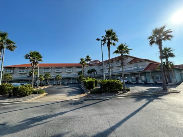Ground Floor Retail / Office Space located within The Plaza mixed use condo. This is located just north of Highway 98 in East Destin.This space is located on east side of the Plaza and has a generally open floor plan. Double front doors, open reception area, large open work space / retail area, hallway down the right side, opening into a private office in the rear. Space has a rear access door as well as parking in the rear.Target rent is $22/SF base rent + Association Dues, Property Taxes + sales tax = $3394 per month. 5 year lease preferred.