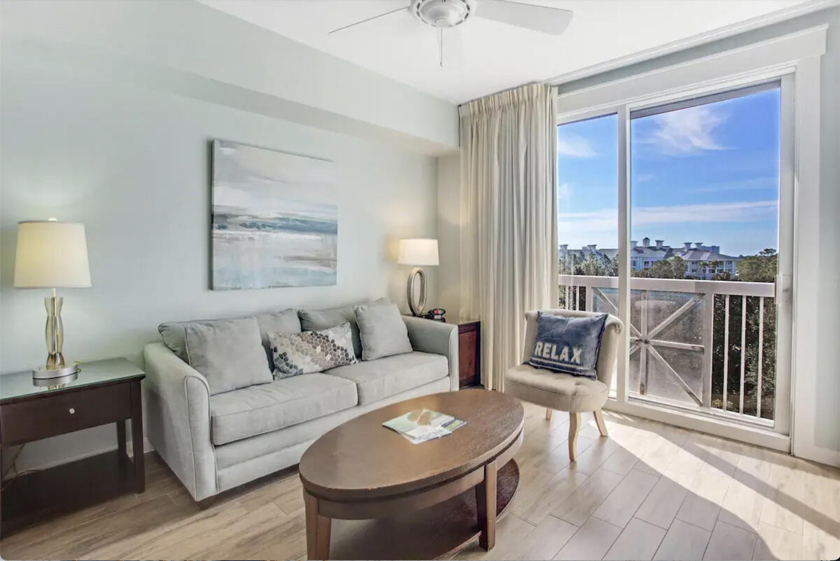 This updated 6th-floor studio offers serene views of the Grand gardens, resort-style pool, and Choctawhatchee Bay from your own Juliette balcony. The space features low-maintenance porcelain plank tile throughout. Fully furnished, it includes a king-size bed, a new sleeper sofa, a sitting chair, and a kitchenette equipped with a mini-fridge, sink, and coffee maker. Ownership at Elation comes with perks like underground parking, a seasonally heated pool, hot tubs, and access to the exclusive Solstice Club, perfect for entertaining while enjoying breathtaking bay sunsets. Ideally located minutes to The Village of Baytowne Wharf, with access to shops, dining, playground, live music, and more. Sandestin shuttle service provides transportation across the resort and to the beach.