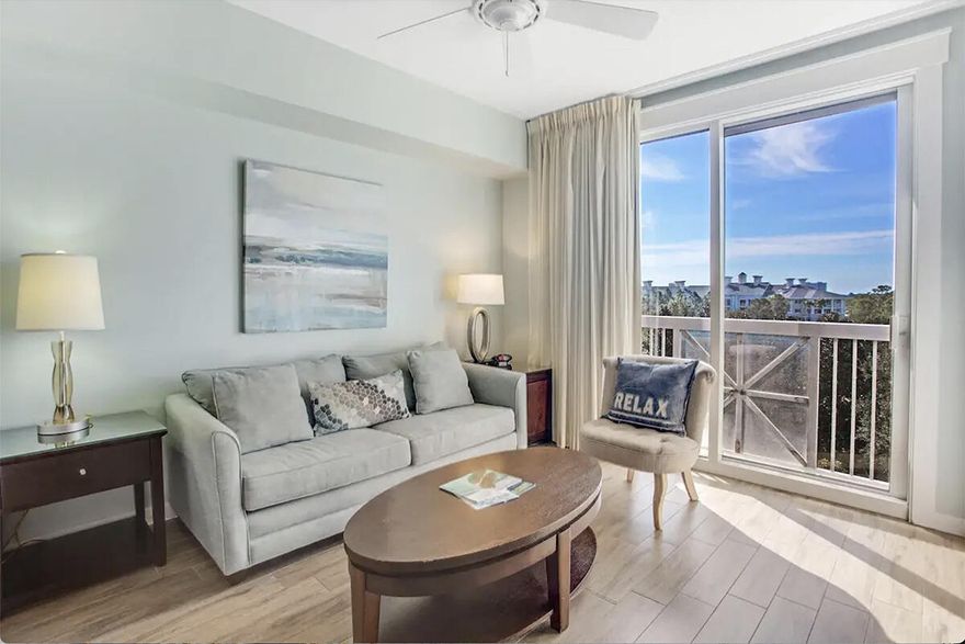 This updated 6th-floor studio offers serene views of the Grand gardens, resort-style pool, and Choctawhatchee Bay from your own Juliette balcony. The space features low-maintenance porcelain plank tile throughout. Fully furnished, it includes a king-size bed, a new sleeper sofa, a sitting chair, and a kitchenette equipped with a mini-fridge, sink, and coffee maker. Ownership at Elation comes with perks like underground parking, a seasonally heated pool, hot tubs, and access to the exclusive Solstice Club, perfect for entertaining while enjoying breathtaking bay sunsets. Ideally located minutes to The Village of Baytowne Wharf, with access to shops, dining, playground, live music, and more. Sandestin shuttle service provides transportation across the resort and to the beach.