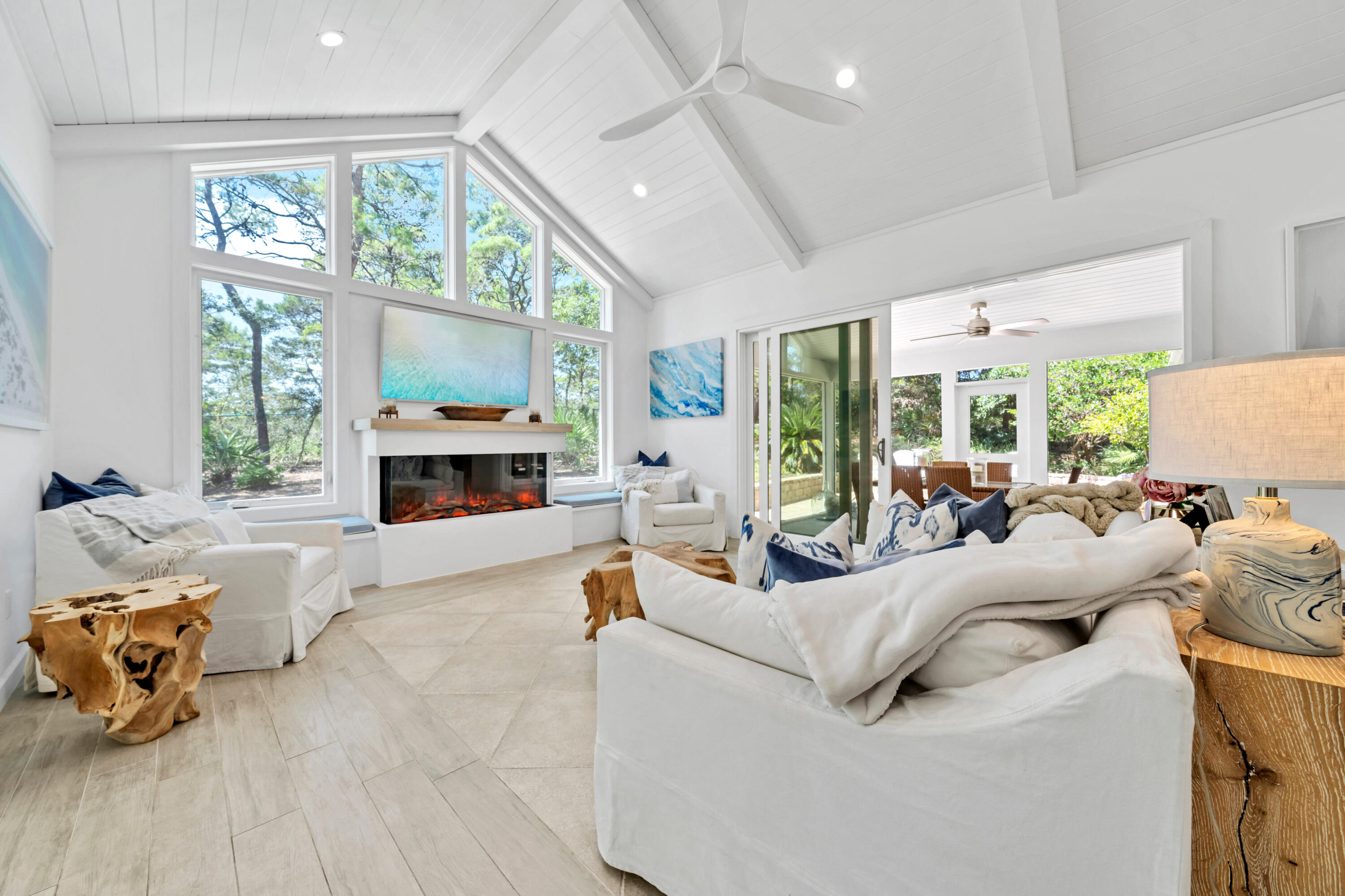 This Ideal Local Retreat has the best of both worlds! Peaceful Privacy AND right near the beach! Newly constructed addition added for open-concept living areas, vaulted tongue & groove ceilings, full slider sliding glass doors and porcelain tile give this home that modern beach vibe! Nestled on a HALF ACRE parcel, this truly is a place of peace & privacy tucked away from the hustle & bustle! It checks all the boxes! HUGE private lot with room for pool, stunning new additions, NO HOAs and only 1/2 mile to all the shops, restaurants & Emerald waters of 30a! Looking for a private estate but close enough to bike to the beach? Look no further. Buy your beach house where it feels like home!
