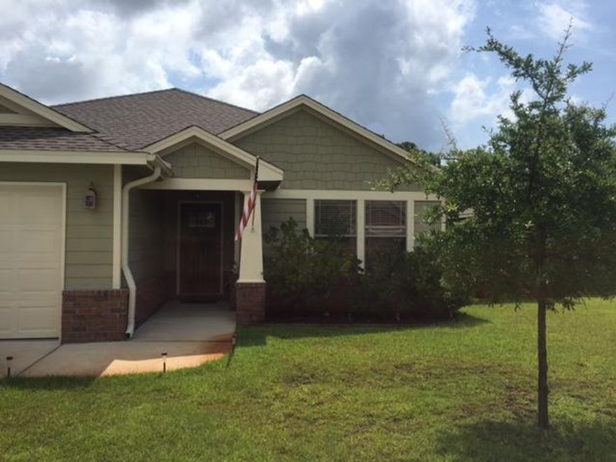 LIKE NEW! Adorable starter home in Cottages at East River. LOCATED MINUTES FROM THE BEACHES AND HURLBURT AFB. This home features 3 Bedrooms, 2 Baths, an Open Kitchen to the Large Great Room, Tile floors in ALL of the Wet Areas, Large Wraparound Granite Breakfast Bar, Separate Dining area, Stainless Steel Appliances, 10' ceilings in Living room with Crown Molding, Spanish lace ceiling, Stained Fiberglass entry door, 30 yr high definition Dimensional Shingles, Termite and Fire Resistant Hardie Plank Siding and soffits. Home also has security system and sprinkler system that runs off of a community well! This home is a MUST see!