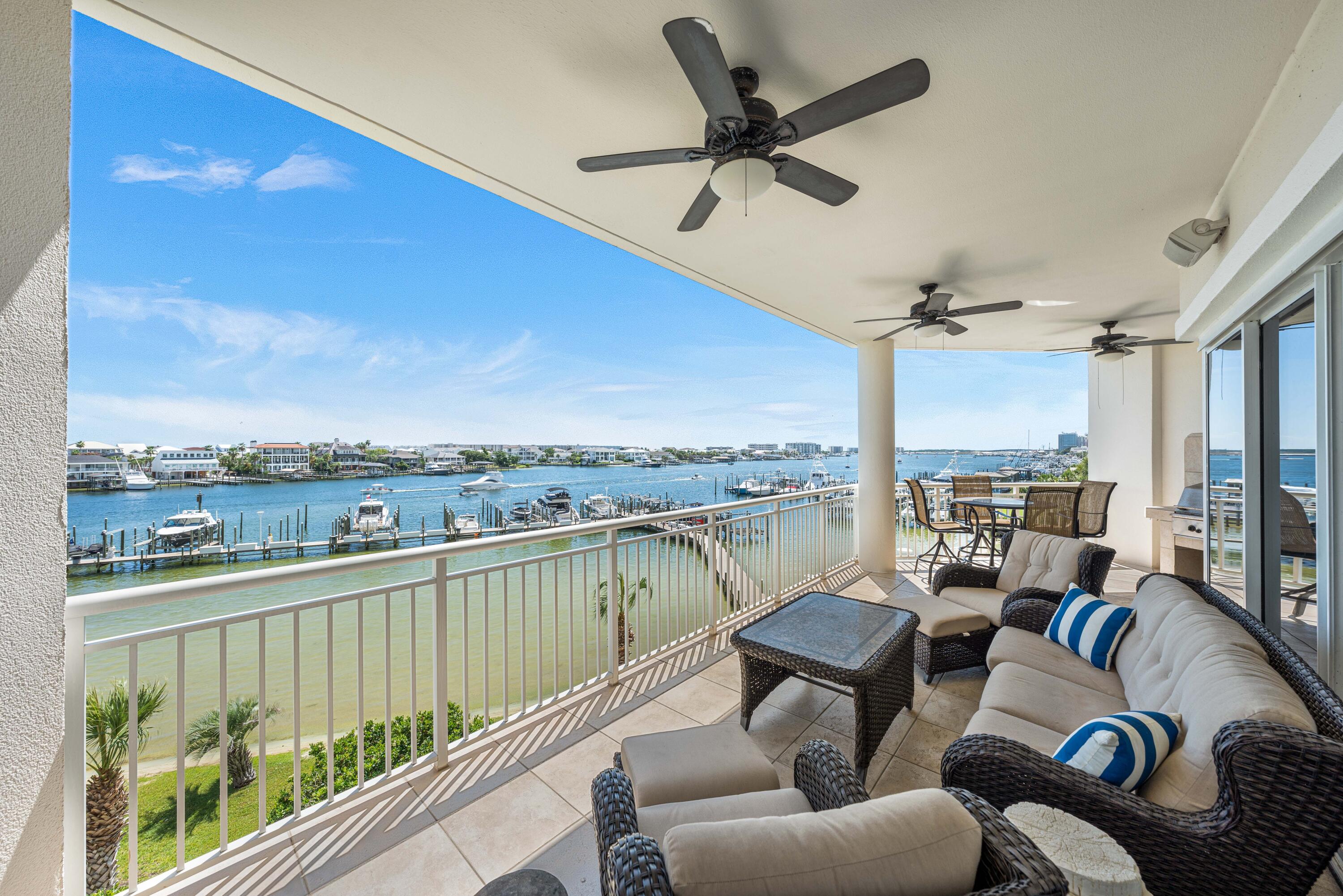 Grand Harbor sits at the front row of everything that makes Destin Harbor vibrant--fireworks, boat parades, and sunsets that define the view.Inside, ceilings soar to 9.5 feet and the layout flows effortlessly into an open living, a chef's kitchen with gas cooking, and floor‑to‑ceiling windows capture uninterrupted water views. The primary suite stretches across the harbor side with its own balcony, dual walk-ins, and a spa bath built for serious unwinding. Two additional guest suites each have full baths, with the west-facing guest suite putting sunsets front and center.Grand Harbor's no short-term rental policy keeps the community quiet and private. It's a place where you know your neighbors, mornings stay peaceful, and the harbor feels like home. Beyond your door, a heated waterfront pool and hot tub, private marina with boat slips, Tesla charging, and a fitness center are all steps away. The community also offers a clubhouse, conference center, and even a dog park. A reserved guest suite welcomes visiting friends and family, while secure gates and the parking garage create peace of mind.