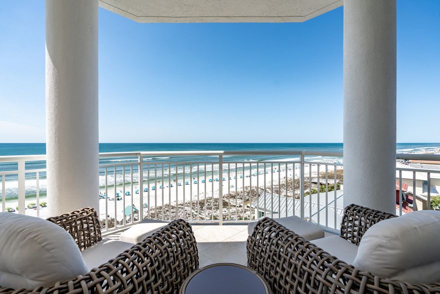 Exceptional gulf front living at Grand Villas, a private non-rental gated community within Hidden Dunes in Miramar Beach. Coveted western-facing end unit ensures the ultimate in privacy with forever sunset views. Secluded outdoor entry leads into the light filled foyer opening to the floor to ceiling walls of glass viewing the sea, sunrise and sunset.  Grand spacious rooms. Nicely equipped kitchen with window at sink, pantry and breakfast bar. Expansive covered wrap around balcony accessible from master and family room with gas grill. Gulfside master suite with 2 huge closets and spa inspired bathroom.  Rear wing with three additional spacious guest bedrooms all with full baths, walk in closets and outstanding views. Grand Villa is gated and has a private pool, gym, garage & beach access.