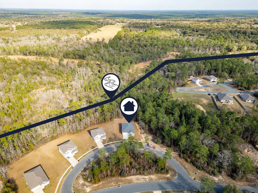 ALL BRICK NEW CONSTRUCTION ON .53 ACRE LOT... BORDERED BY LUSH WOODS WITH FLOWING CREEK.. NOW AVAILABLE!  Did I mention this one comes with $10,000 BONUS CASH?Word is spreading about the new **VA-APPROVED--SEMI-CUSTOM--LOCAL BUILDER**, and he just snagged one of the best lots in Heritage Plantation... CREEKFRONT on CRESCENT STREET! This site will feature the builder's 4 bedroom/2 bath ''Heritage Plan'' and comes with $10,000 BONUS CASH that buyers can spend anyway they see fit (price reduction, closing cost assistance, fencing).There's more! Use the builder's preferred lender, and she'll buy down your interest rate! Yep! That too!Now let's talk floorplan!This home will feature luxury vinyl plank throughout (no carpet), neutral paint, elevated ceilings,(continued) upgraded light fixtures, and the builder's signature molding/trim package.

The kitchen will feature white shaker-style cabinetry, stainless steel appliances, GORGEOUS GRANITE ISLAND and a WALK-IN PANTRY!

The living room is large, with adjoining dining space overlooking the private covered patio. The patio area offers peaceful views of the woods and creek.

The master bedroom is spacious with tray ceiling, and large windows that flood the room with light. The master bath boasts luxury granite counters, as well as a custom tiled walk-in shower, big enough for two!

The three remaining bedrooms are spacious, with generously-sized closets. The guest bath features more luxury granite with standard tub/shower combination.

Other perks with purchase include: builder warranty, free survey, free termite bond, free landscaping package, and COUNTY TAXES!

This builder is known for quality construction and premium upgrades. This one is priced to move. Make an offer today!