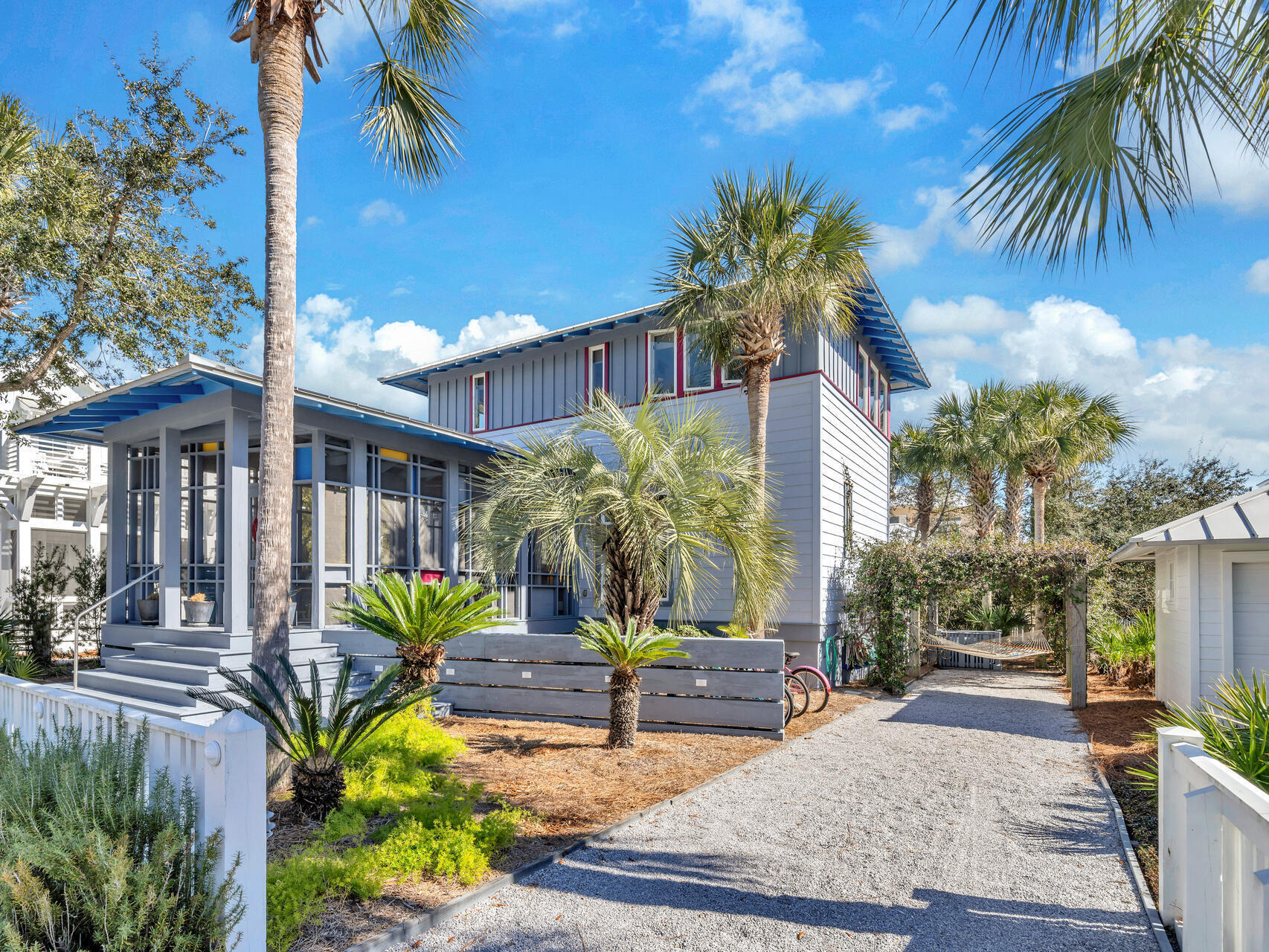 Home is located in the Gulf Front Community of Carillon Beach, All the homes are on the Gulf Side of highway. The Home was featured in Cottage Living Magazine April 2006. Designed by architect Gary Justiss. This modern upbeat cottage is overflowing with vibrant colors and eclectic fun furniture. The master bedroom offers a separate office/artist area.Renters agree the front screened room is the favorite. The house is rental ready with several weeks already commited.